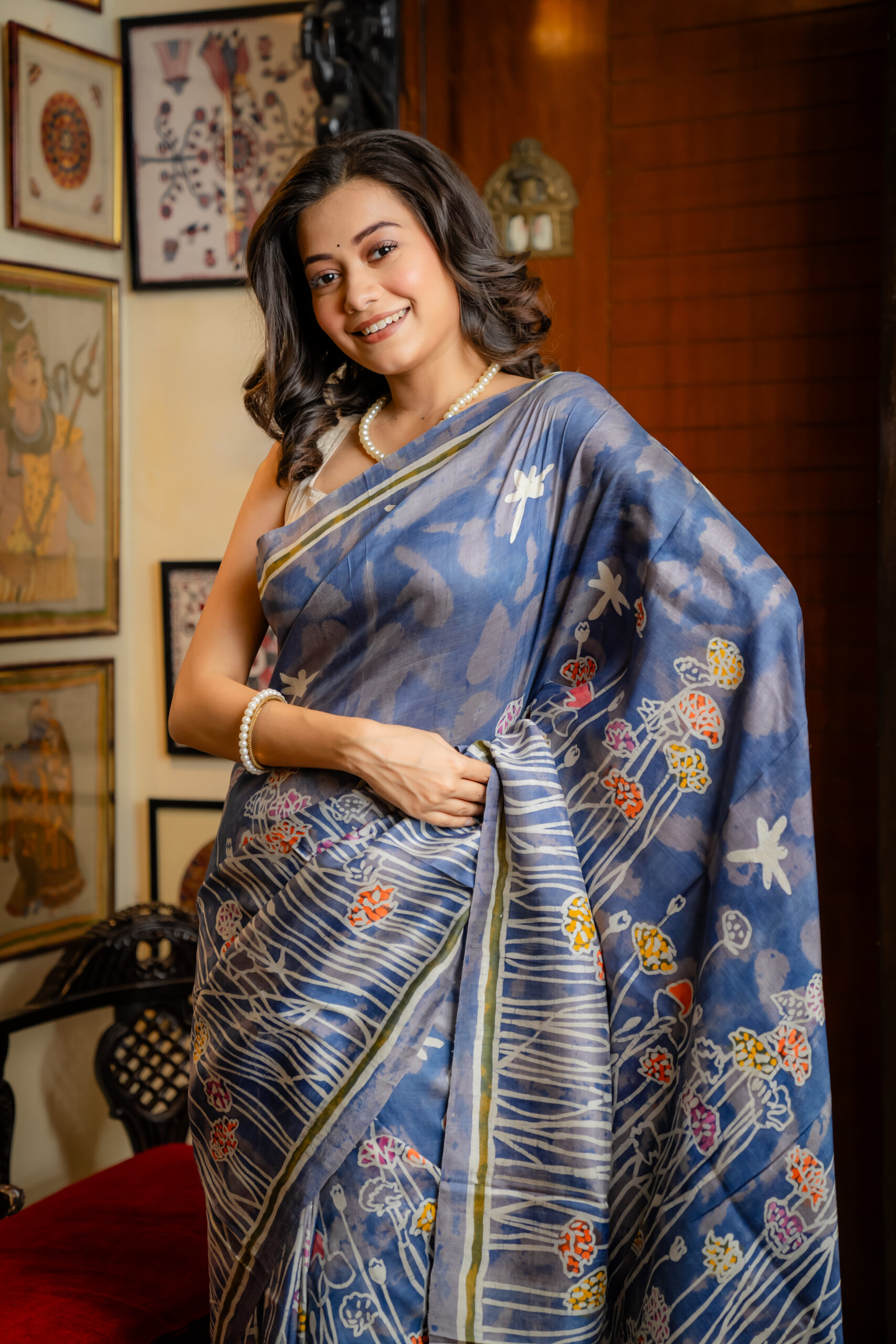 Rich Blue Fabric Adorned with Intricate Flower Designed Batik Saree