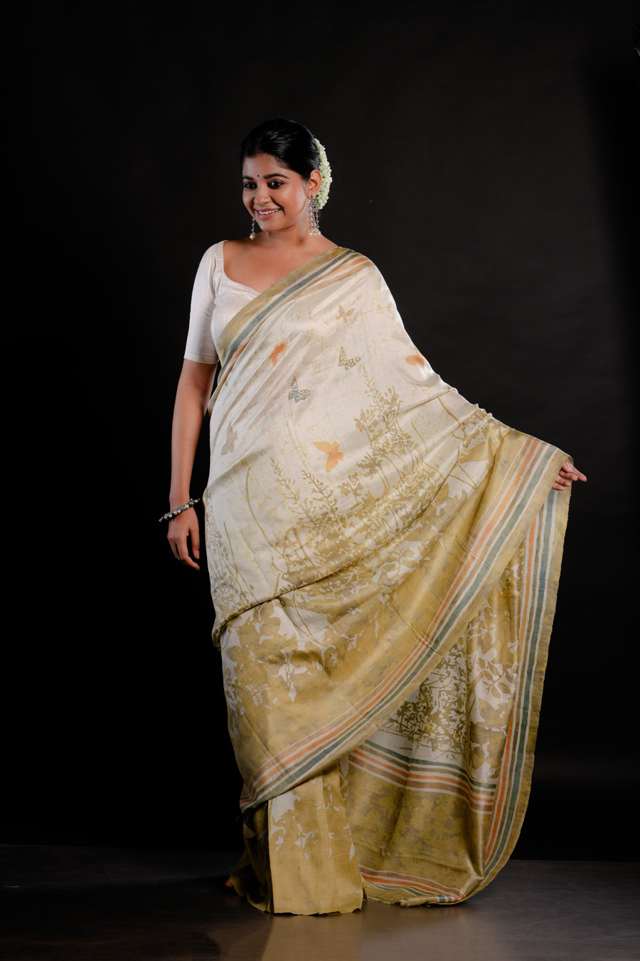 Pristine White and Radiant Gold Hued Silk Saree