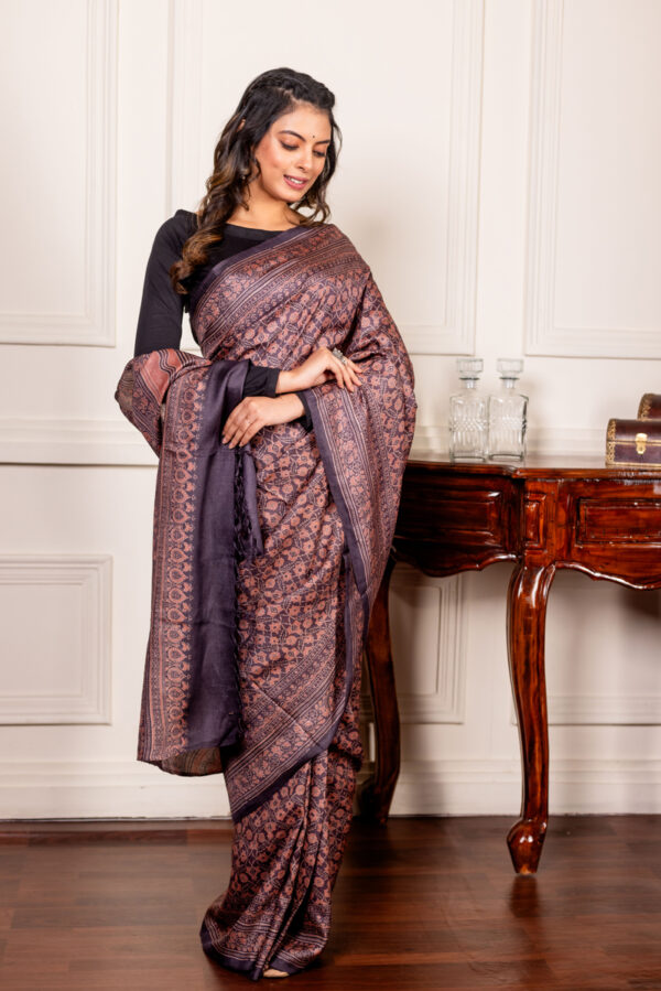 Rich Earth and Intricate Patterns on The Tussar Ajrakh Charm