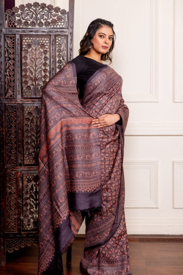Rich Earth and Intricate Patterns on The Tussar Ajrakh Charm - Image 3